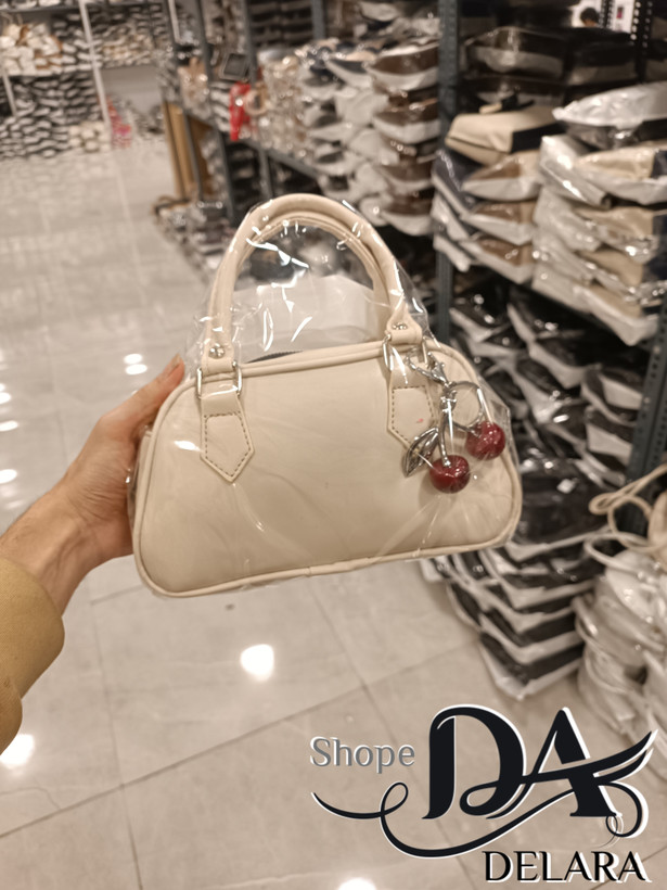 کیف دستی و دوشی زنانه مدل آلبالویی کرمی